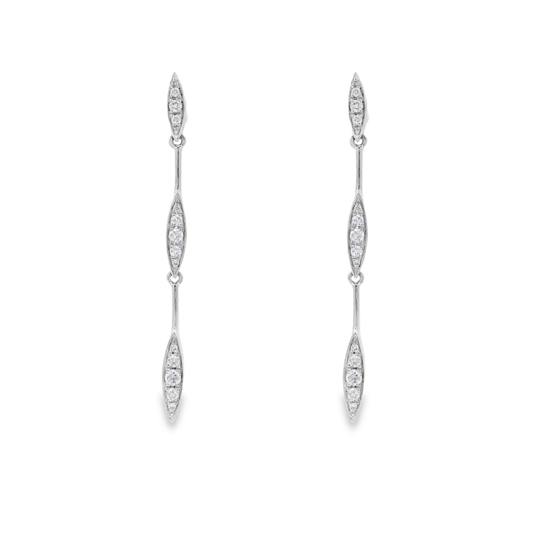 14K White gold dangle earrings with sets of round brilliant diamonds set along the length. Item J36044 - ABC Jewelry Co