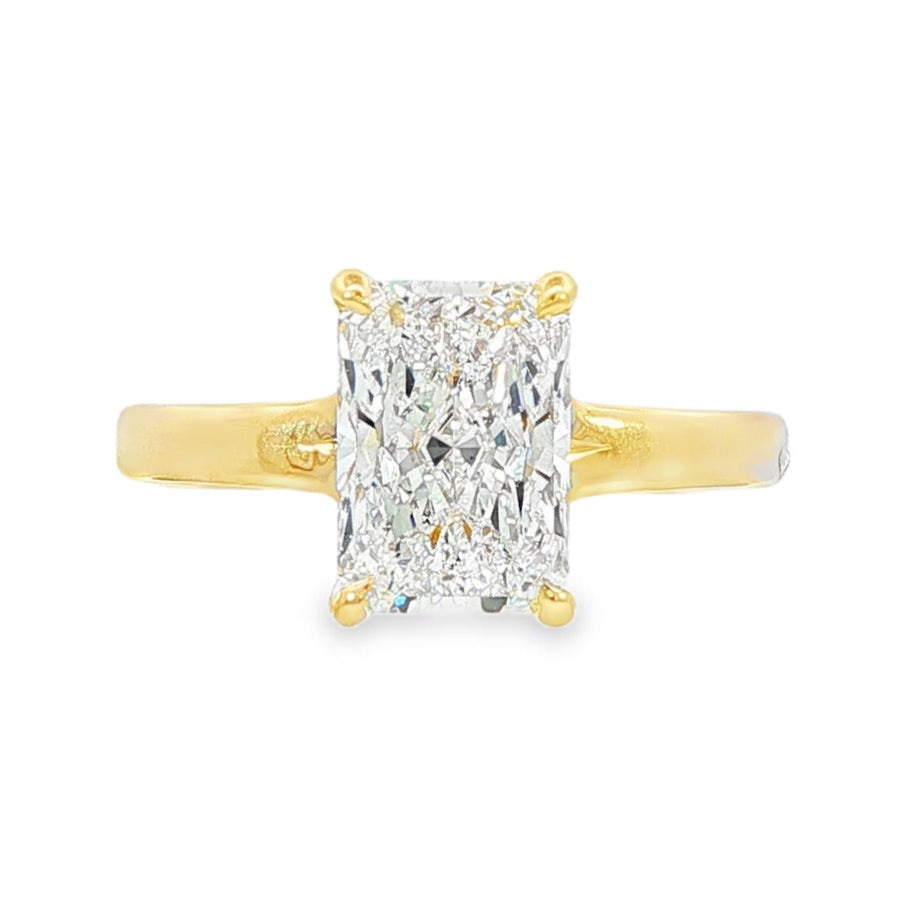 14K Yellow gold solitaire engagement ring set with radiant cut diamond. Item J37991 - ABC Jewelry Co.