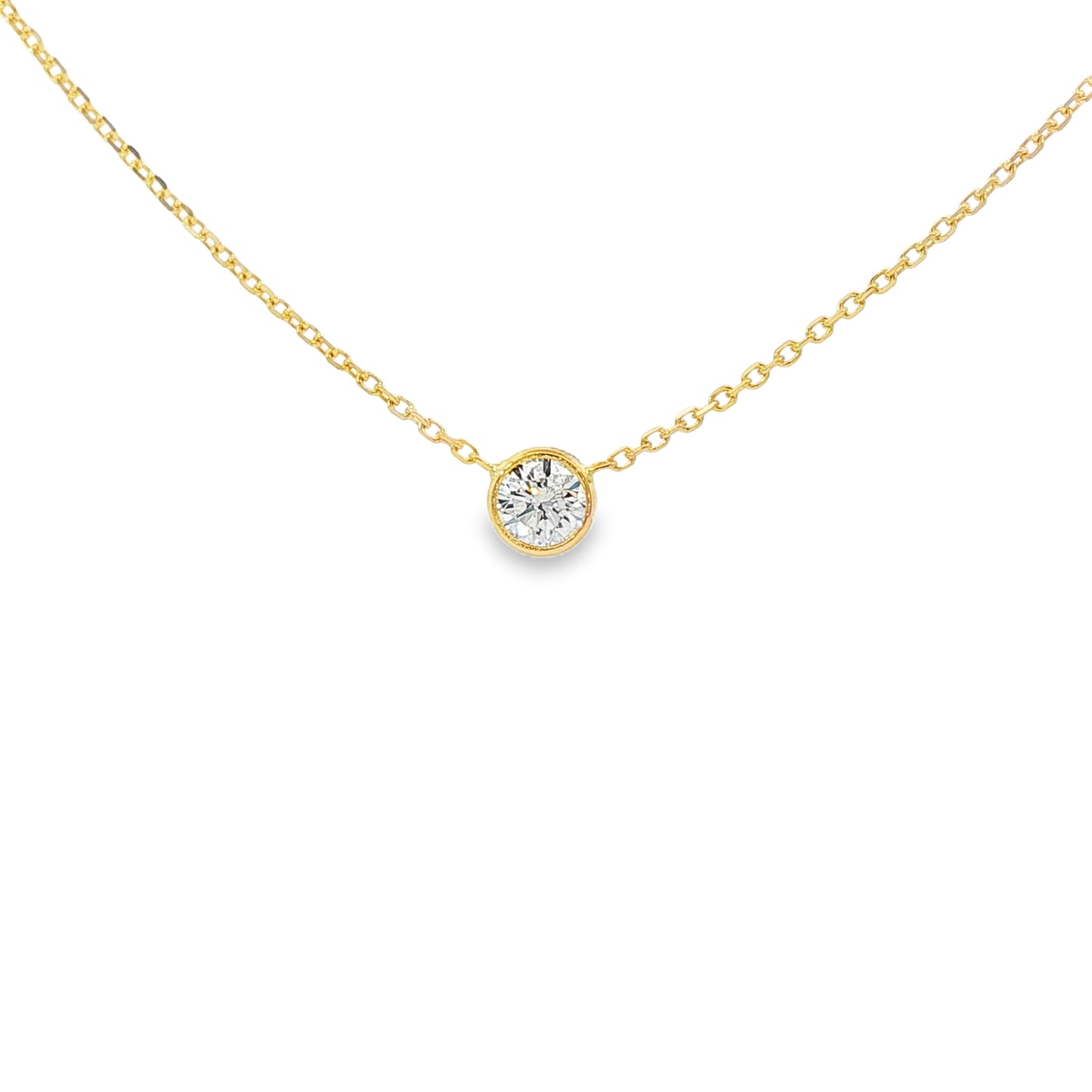 14K Yellow gold bezel set solitaire necklace. Item J38378 - ABC Jewelry Co