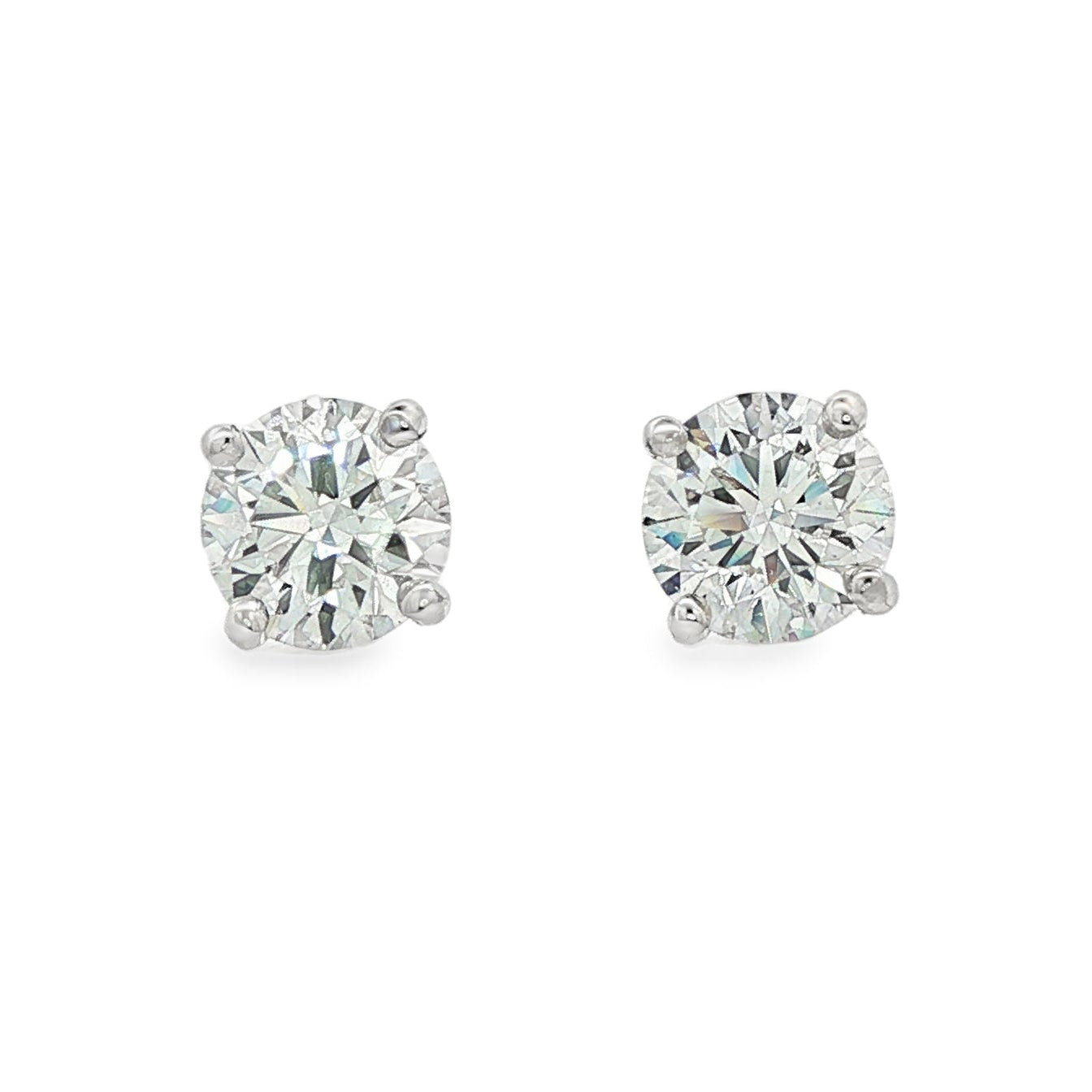14K White gold diamond stud earrings. Item J38704 - ABC Jewelry Co.