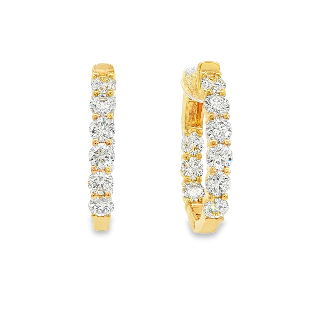 18K Yellow gold diamond hoop earrings. Item J38779 - ABC Jewelry Co.