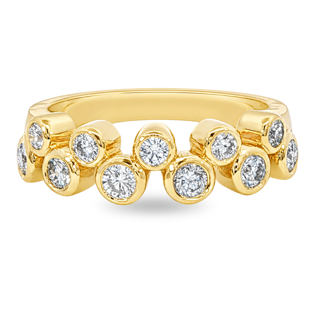 Yellow gold band with a double row of spaced bezel set diamonds, set on a clean white background.