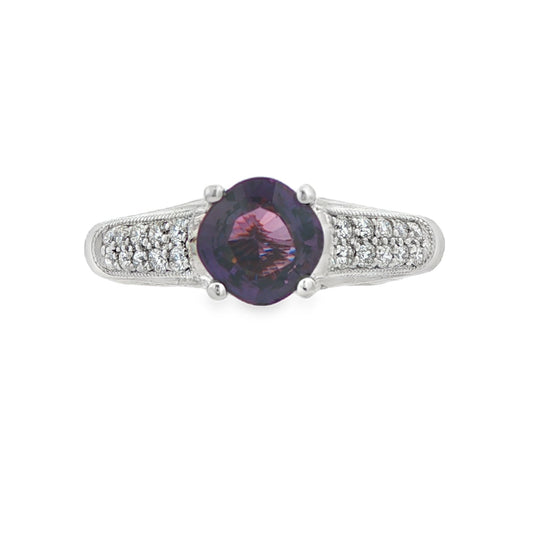 18K White gold ring with a purple sapphire center stone and a pave diamond band. Item 11443 - ABC Jewelry Co. 