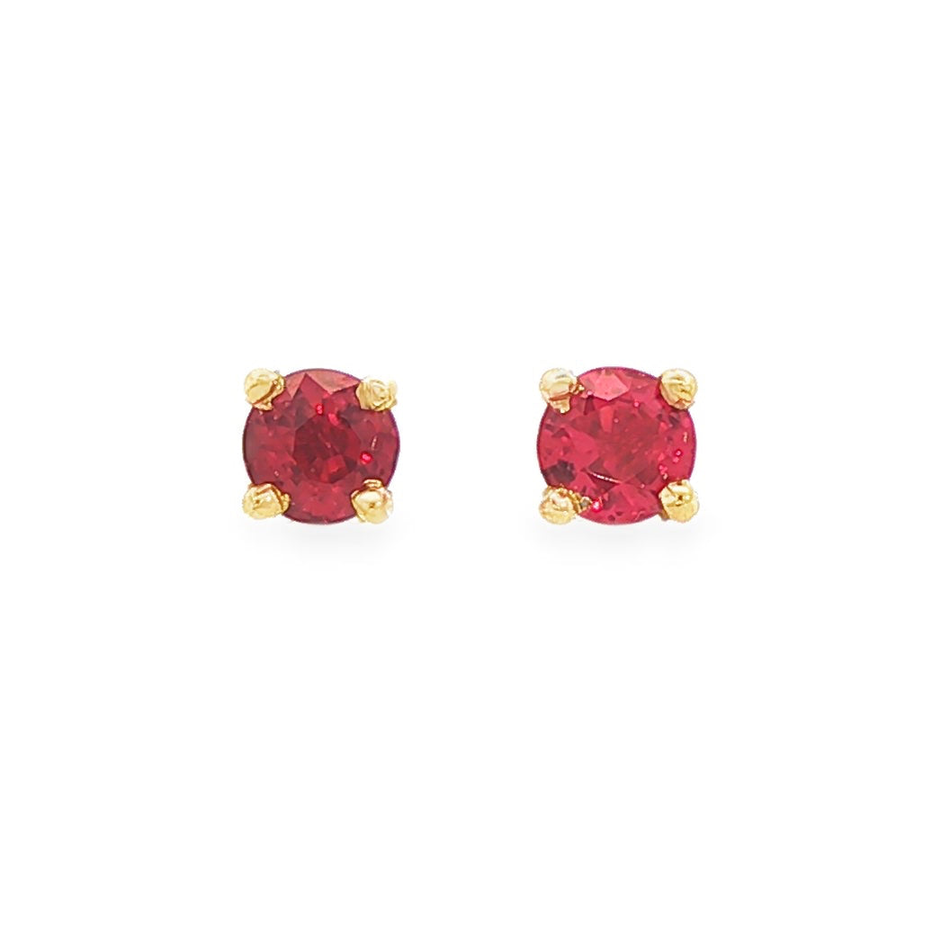 14K Yellow gold stud earring set with round cut rubies. Item 12441 - ABC Jewelry Co. 