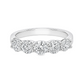 White gold band with 5 round brilliant diamonds in a shared prong setting 