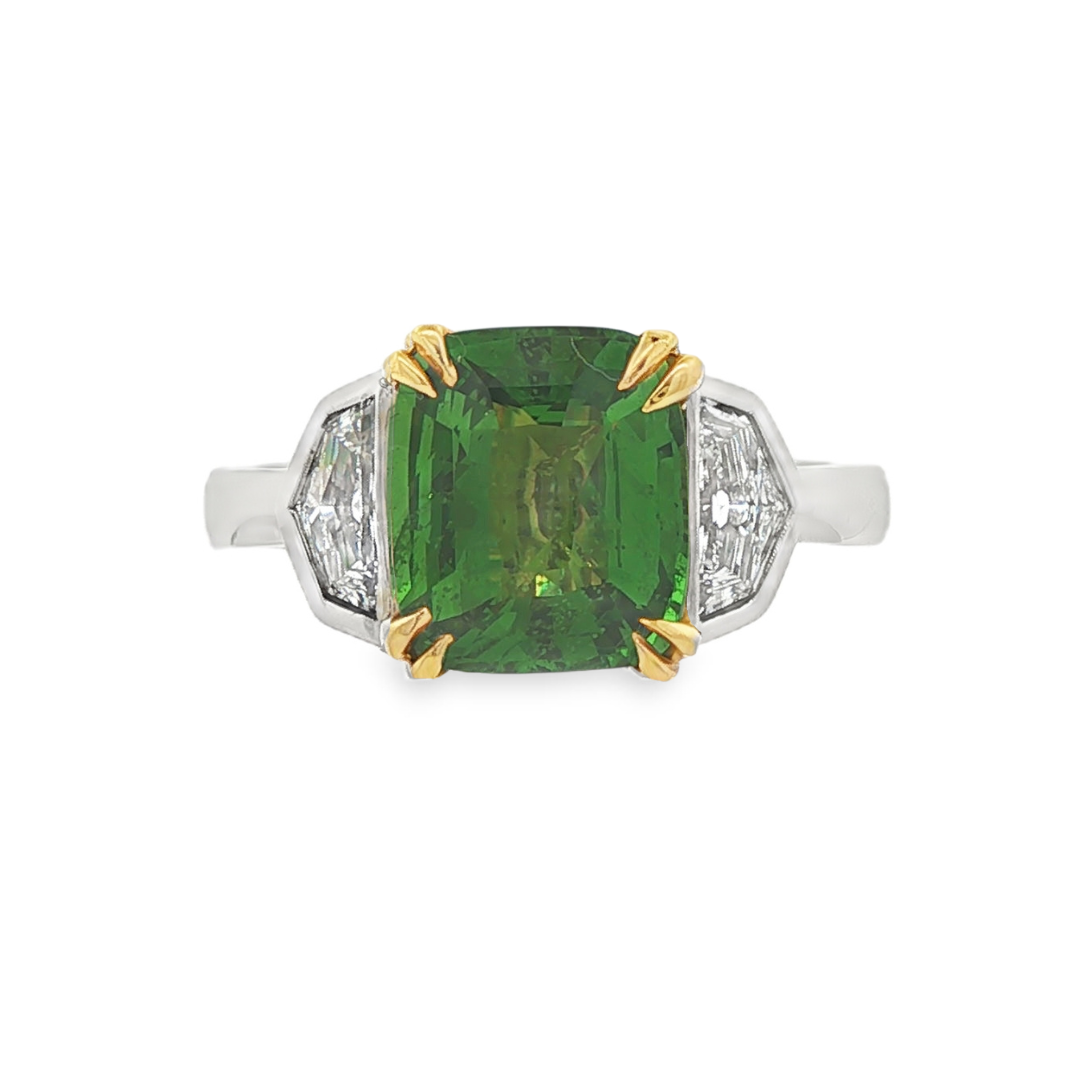 14K white & yellow gold ring set with a green tsavorite center stone and two Cadillac cut diamonds. Item #J36895 - ABC Jewelry Co.