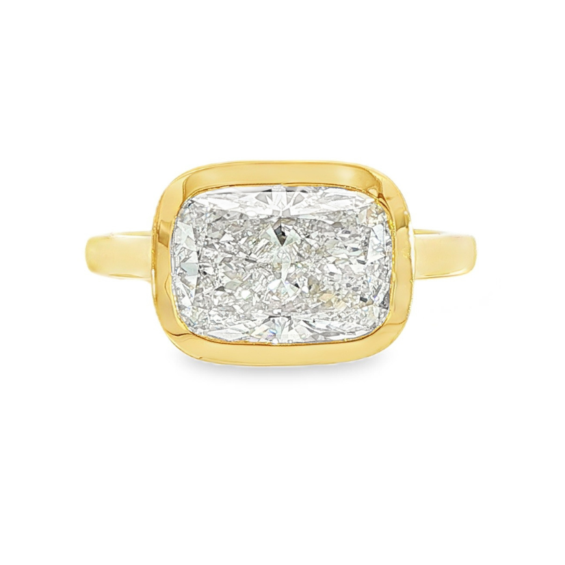 14K Yellow gold ring bezel set with a cushion cut lab grown diamond set east-west. Item J38794 - ABC Jewelry Co. 