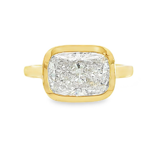 14K Yellow gold ring bezel set with a cushion cut lab grown diamond set east-west. Item J38794 - ABC Jewelry Co. 