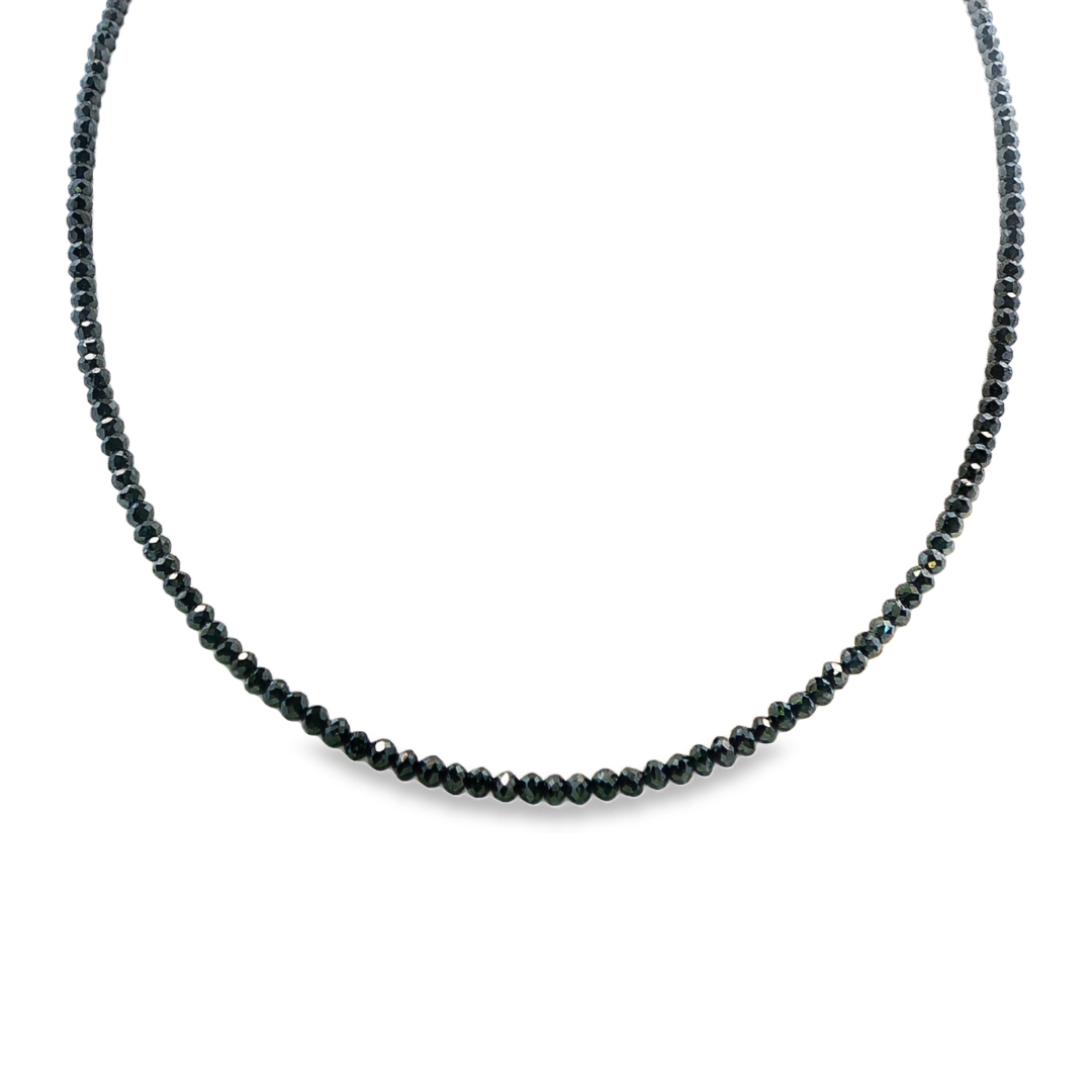 Black diamond strand necklace with 14K yellow gold clasp. Item J38678 - ABC Jewelry Co.