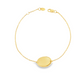 14K Yellow gold delicate chain bracelet with polished oval disc center piece. Item J30491 - ABC Jewelry Co.
