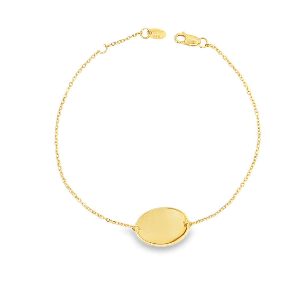 14K Yellow gold delicate chain bracelet with polished oval disc center piece. Item J30491 - ABC Jewelry Co.