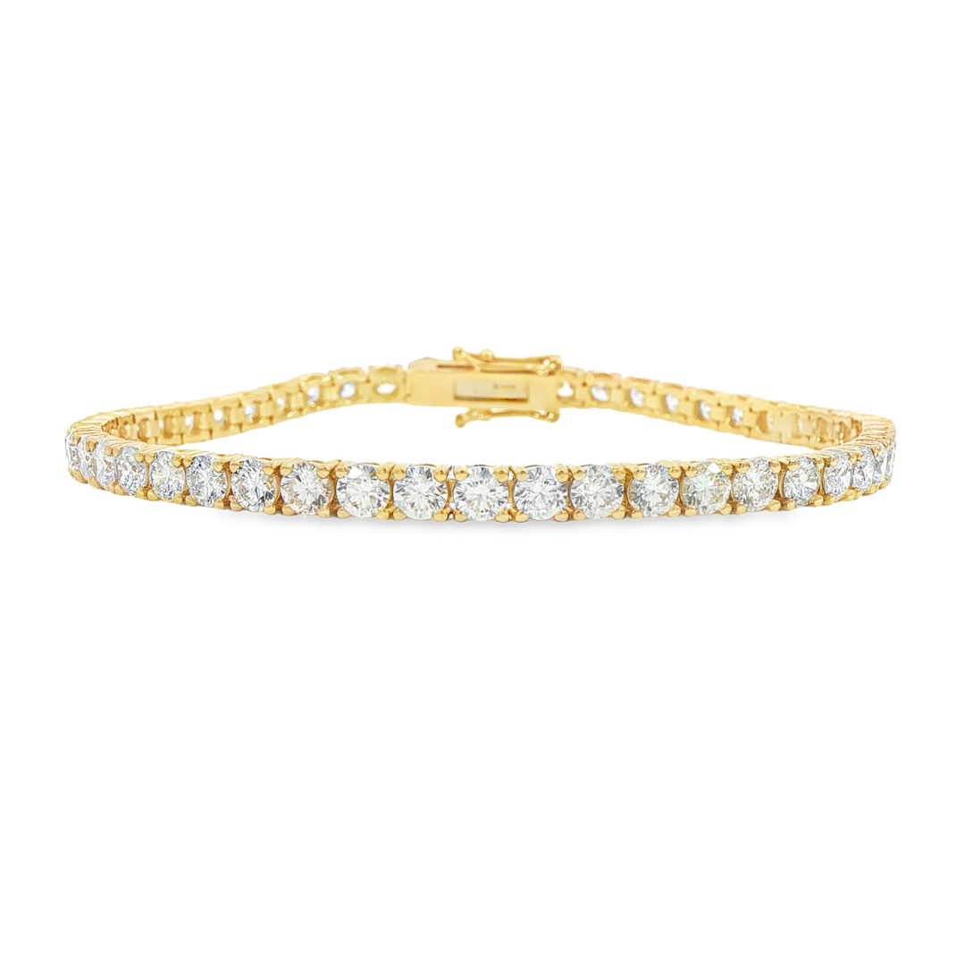 14K Yellow gold tennis bracelet set with round brilliant diamonds. Item J38986 - ABC Jewelry Co. 
