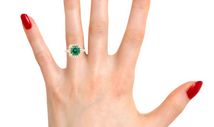 Round emerald and Diamond ring