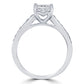 A radiant cut diamond engagement ring in a white gold band with pavé diamonds on either side, shown on a clean white background.