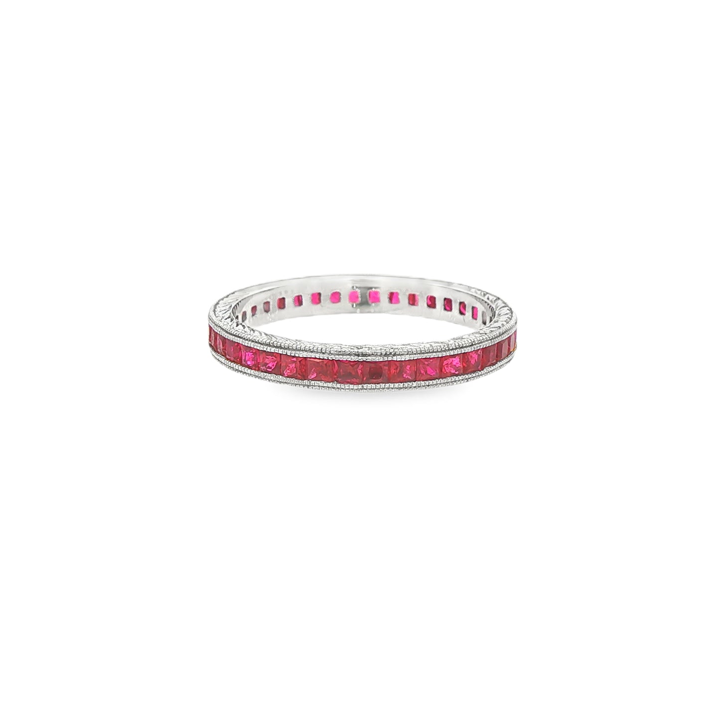 18K White gold eternity band set with princess cut rubies. Item 23024 - ABC Jewelry Co.