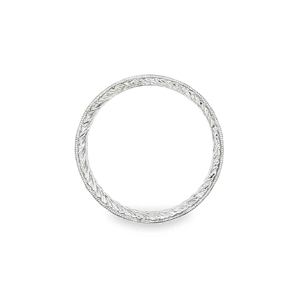 18K White gold eternity band set with princess cut rubies. Item 23024 - ABC Jewelry Co.