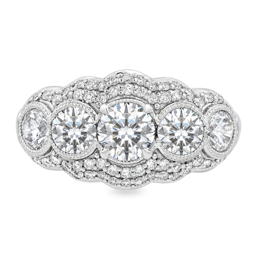 White gold 5 stone diamond ring with a double row halo around all stones. Shown on a clean white background.