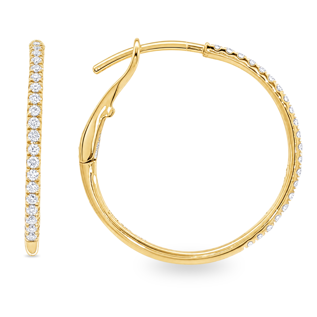 Yellow gold hoop earrings set with a row of round diamonds. One front on and one side profile. Shown on a clean white background.