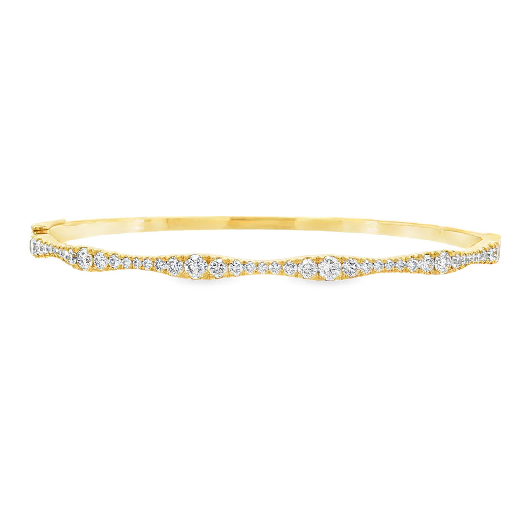 18K Yellow gold hinged bangle bracelet set with round brilliant diamonds. Item J38850 - ABC Jewelry Co. 