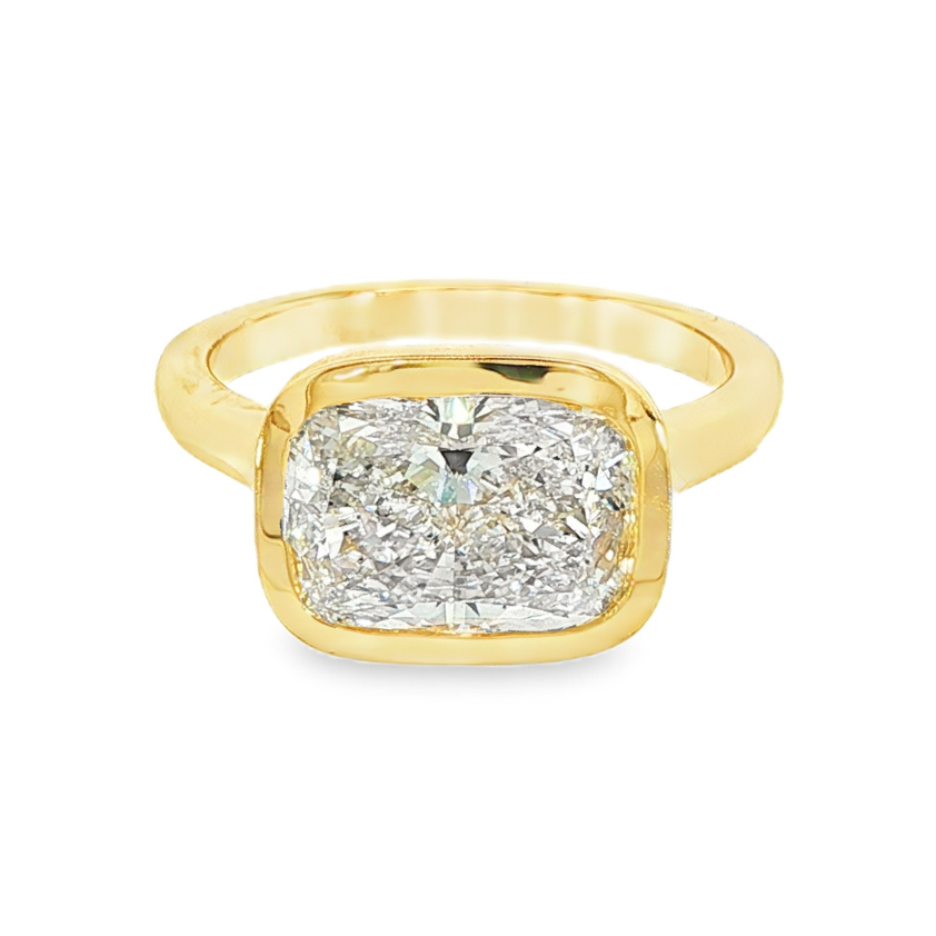 14K Yellow gold ring bezel set with a cushion cut lab grown diamond set east-west. Item J38794 - ABC Jewelry Co. 