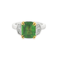 14K white & yellow gold ring set with a green tsavorite center stone and two Cadillac cut diamonds. Item #J36895 - ABC Jewelry Co.