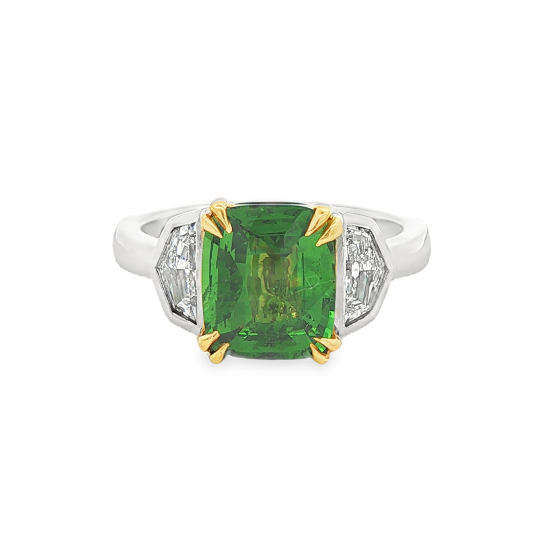 14K white & yellow gold ring set with a green tsavorite center stone and two Cadillac cut diamonds. Item #J36895 - ABC Jewelry Co.