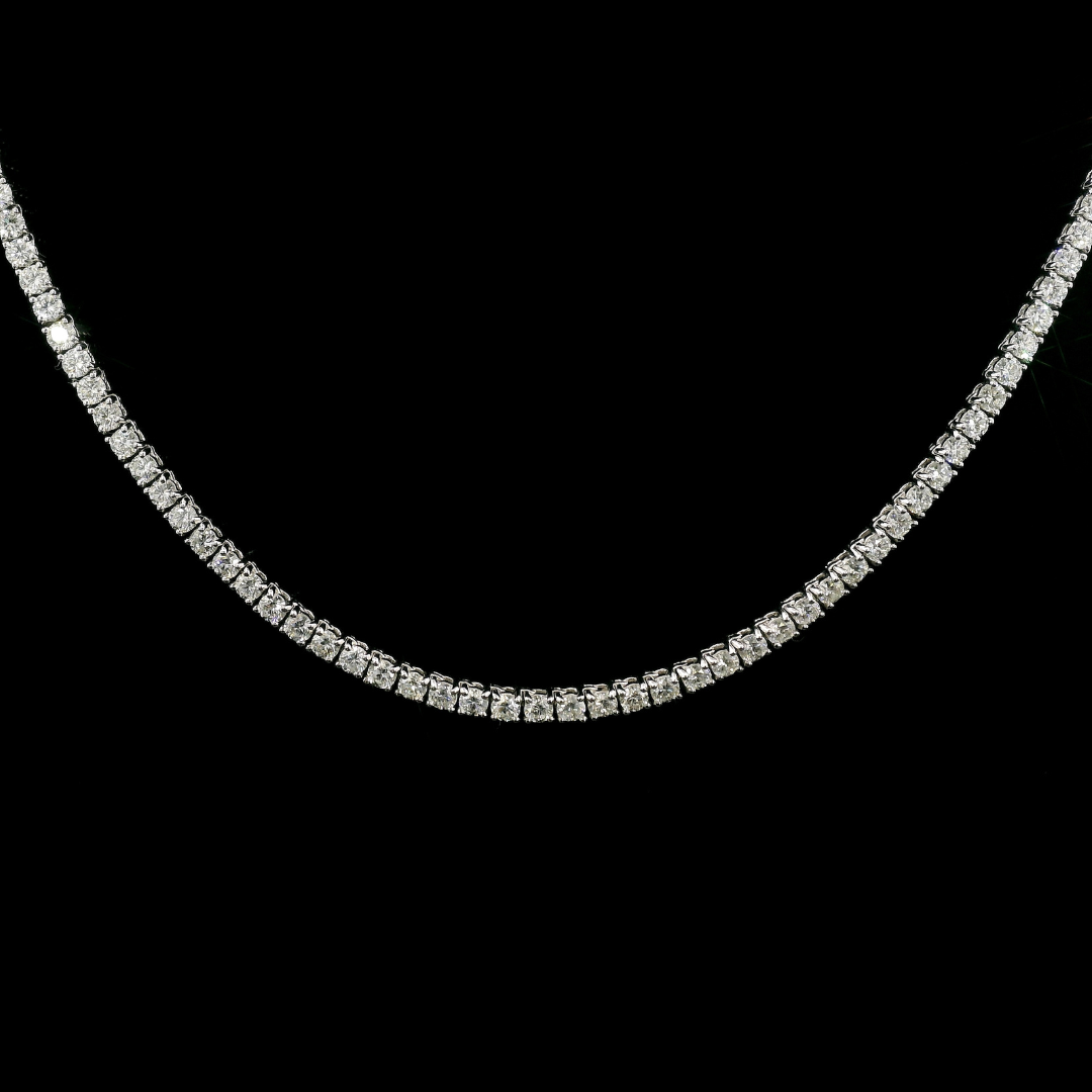 18K White gold tennis necklace set with round brilliant diamonds. Item J36278 - ABC Jewelry Co.