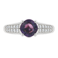 White gold ring with double rows of pave diamonds on the band, set with a purple sapphire. Shown on a clean white background.