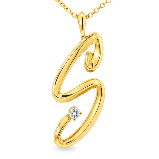 Yellow gold initial 'S' pendant with one round brilliant diamond. Set on clean white background. 
