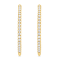 Yellow gold hoop earrings set with a row of round diamonds. Shown on a clean white background.
