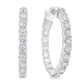 A pair of white gold hoop earrings set with round-cut clear gemstones, shown from two angles on a plain white background.
