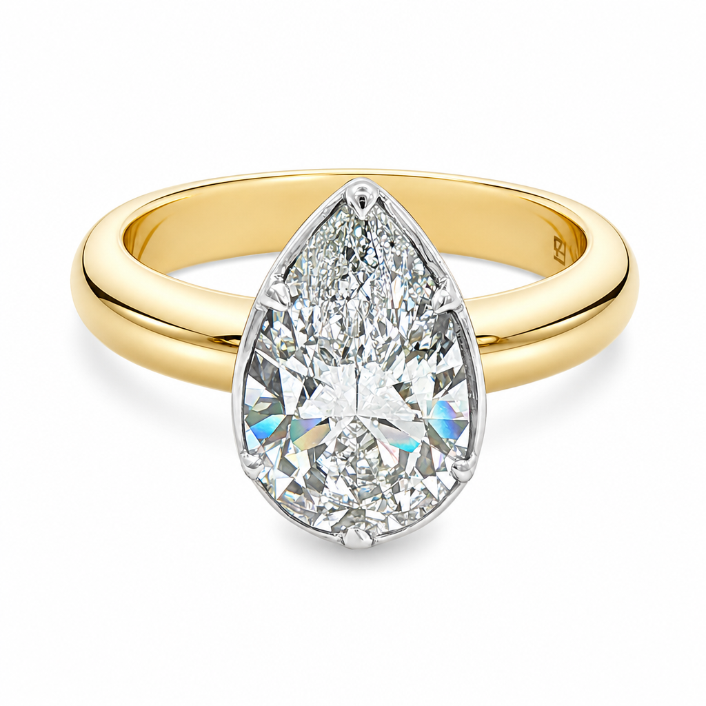 Two tone solitaire engagement ring set with pear shape diamond 