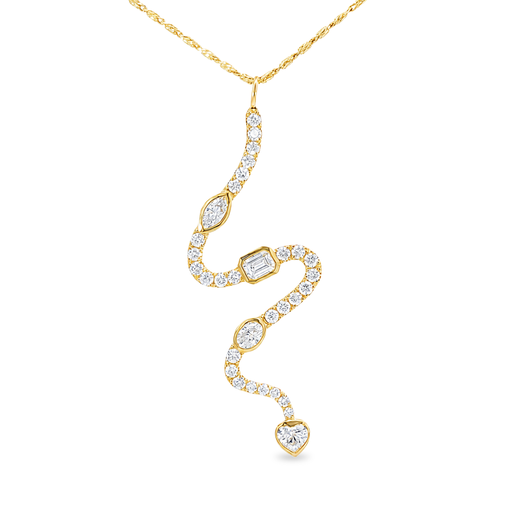 Yellow gold snake shaped pendant set with small round brilliant diamonds interspersed one marquise, emerald cut, oval, and heart shape diamond. Set on clean white background.