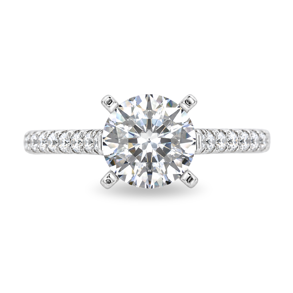 White gold ring with diamonds set along the band, center set with round diamond. Shown on a clean white background.
