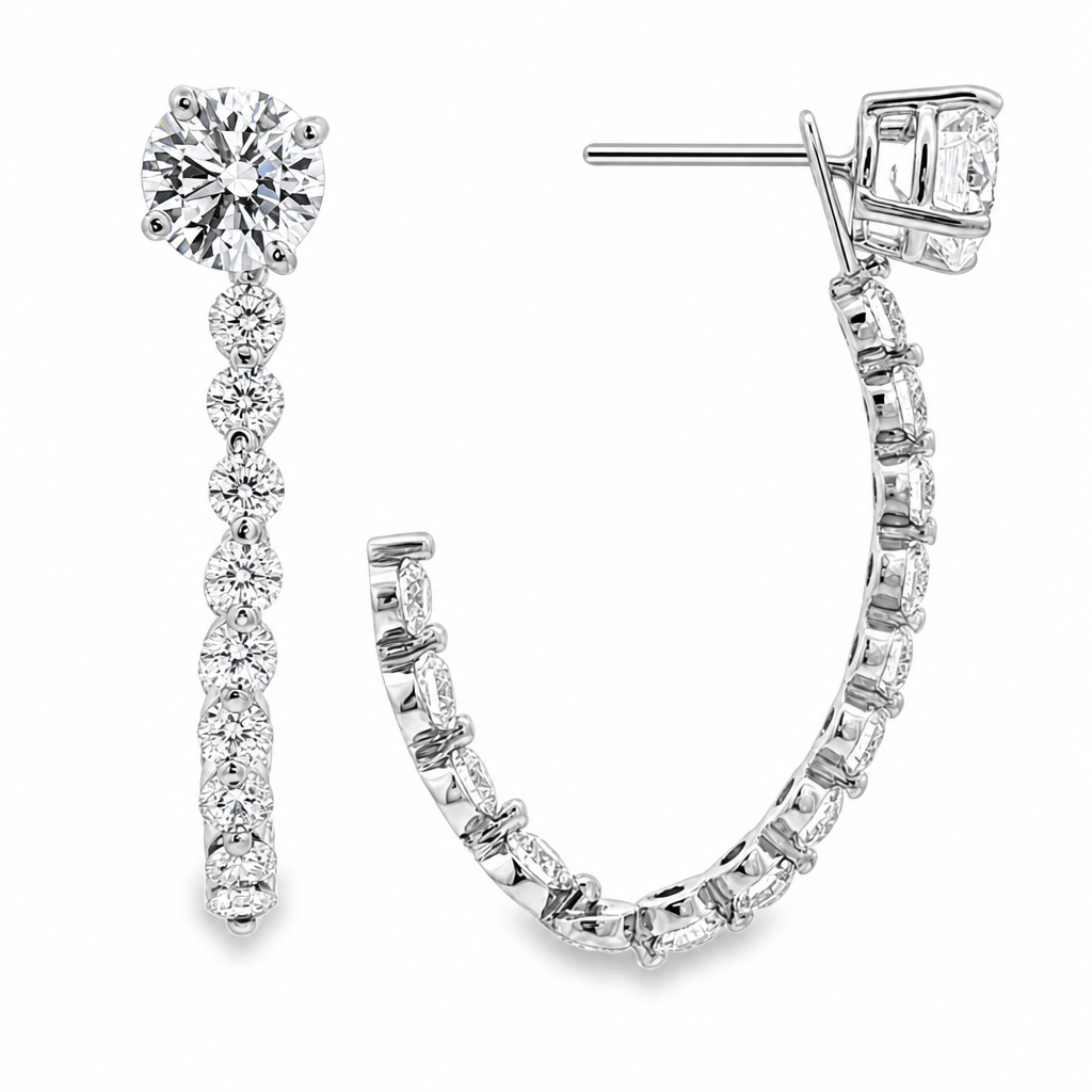 White gold diamond set hoop earring jackets on diamond studs. Shown on clean white background.