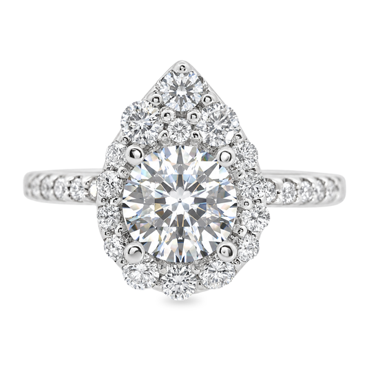 White gold ring set with a round diamond surrounded by a pear shape halo of graduated diamonds with diamonds set along the band. Shown on a clean white background.