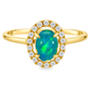 Yellow gold ring with a blue green oval shape opal surrounded by a diamond halo. Set on a clean white background