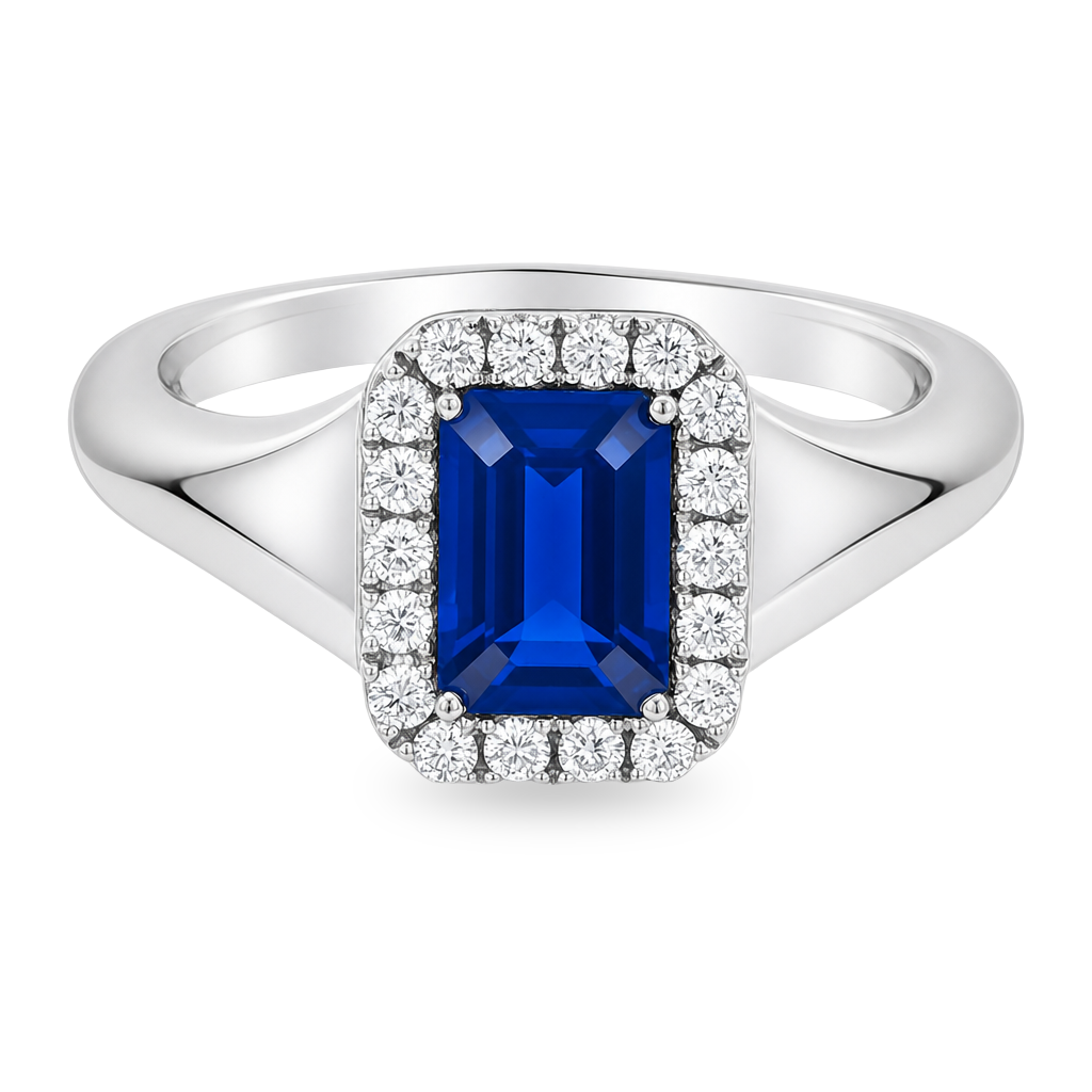 A white gold ring featuring a rectangular emerald-cut blue sapphire center stone surrounded by a halo of small round-cut diamonds. Set on a clean white background.