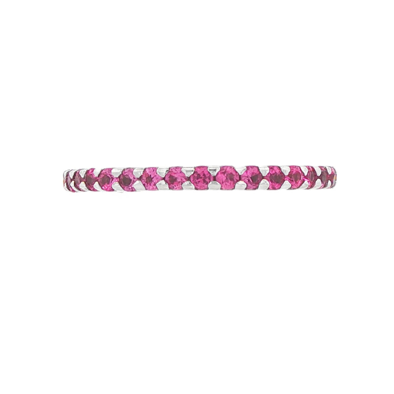 14K White gold eternity band set with pink sapphires. Item 9236 - ABC Jewelry Co.
