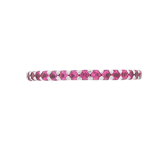 14K White gold eternity band set with pink sapphires. Item 9236 - ABC Jewelry Co.