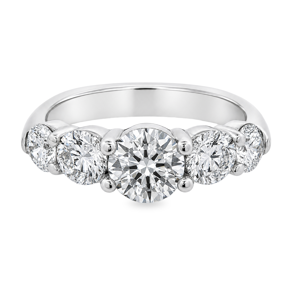 A five-stone diamond ring in a white gold band, featuring a large round center diamond flanked by four smaller round diamonds on each side, set against a plain white background.