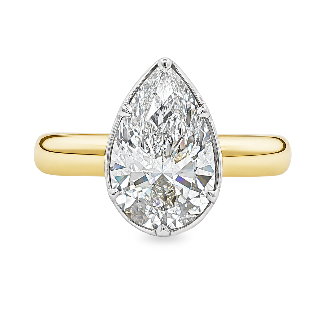 Two tone solitaire engagement ring set with pear shape diamond 