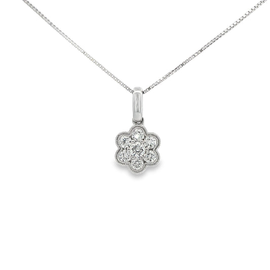 Diamond cluster pendant in floral design, set with round brilliant diamonds. Item J30348 - ABC Jewelry Co.
