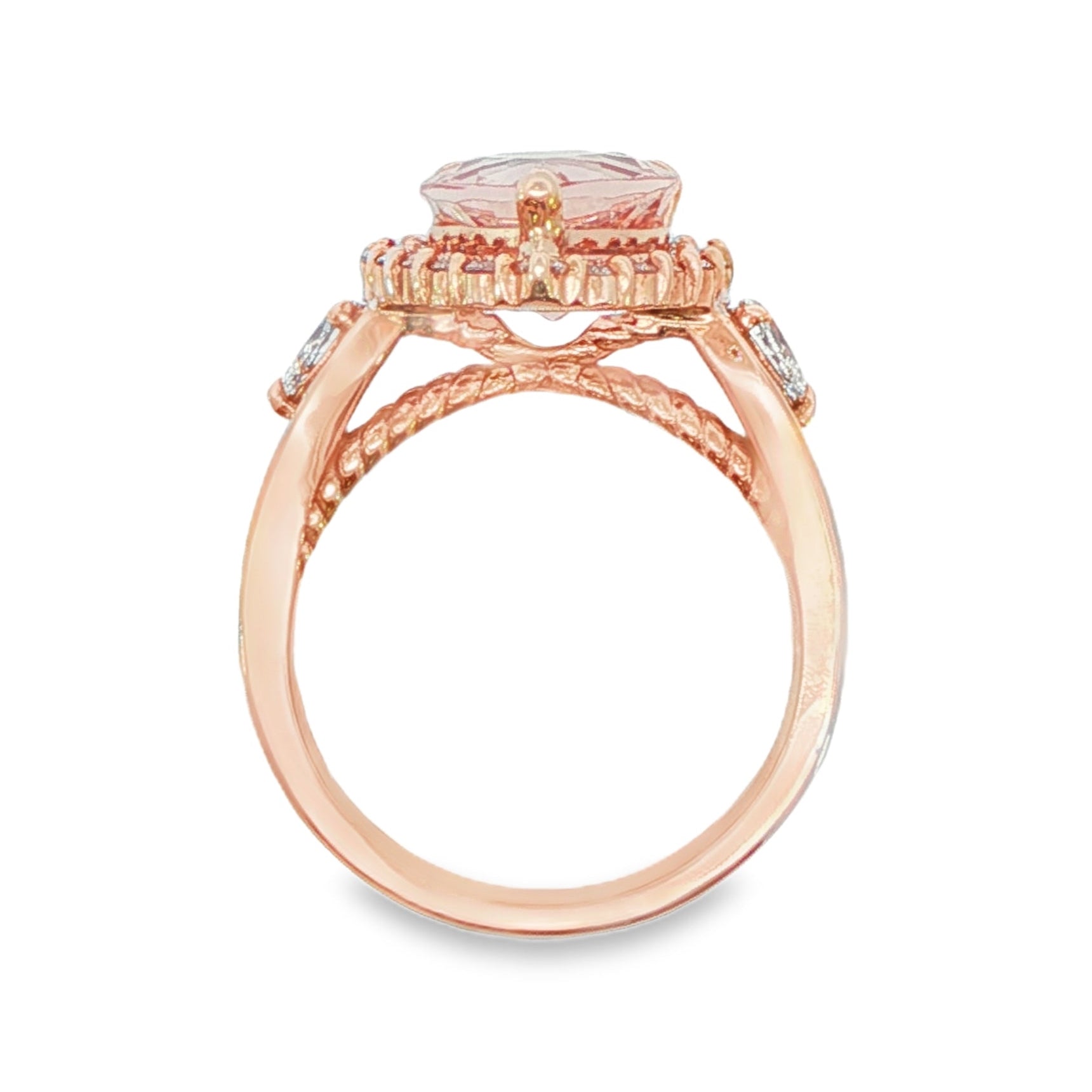 14K Rose gold ring set with a pear shape morganite surrounded with a diamond halo. Item J33283 - ABC Jewelry Co. 