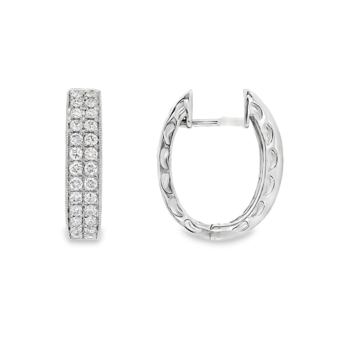 14K White gold diamond pave oval hoop earrings. Item J34762 - ABC Jewelry Co
