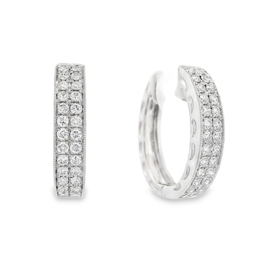 14K White gold diamond pave oval hoop earrings. Item J34762 - ABC Jewelry Co