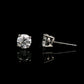 14K White gold stud earrings set with round brilliant diamonds. Item J34789 - ABC Jewelry Co.