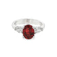 14K White gold ring with red ruby center and pear shape diamond shoulders. Item J35580 - ABC Jewelry Co. 