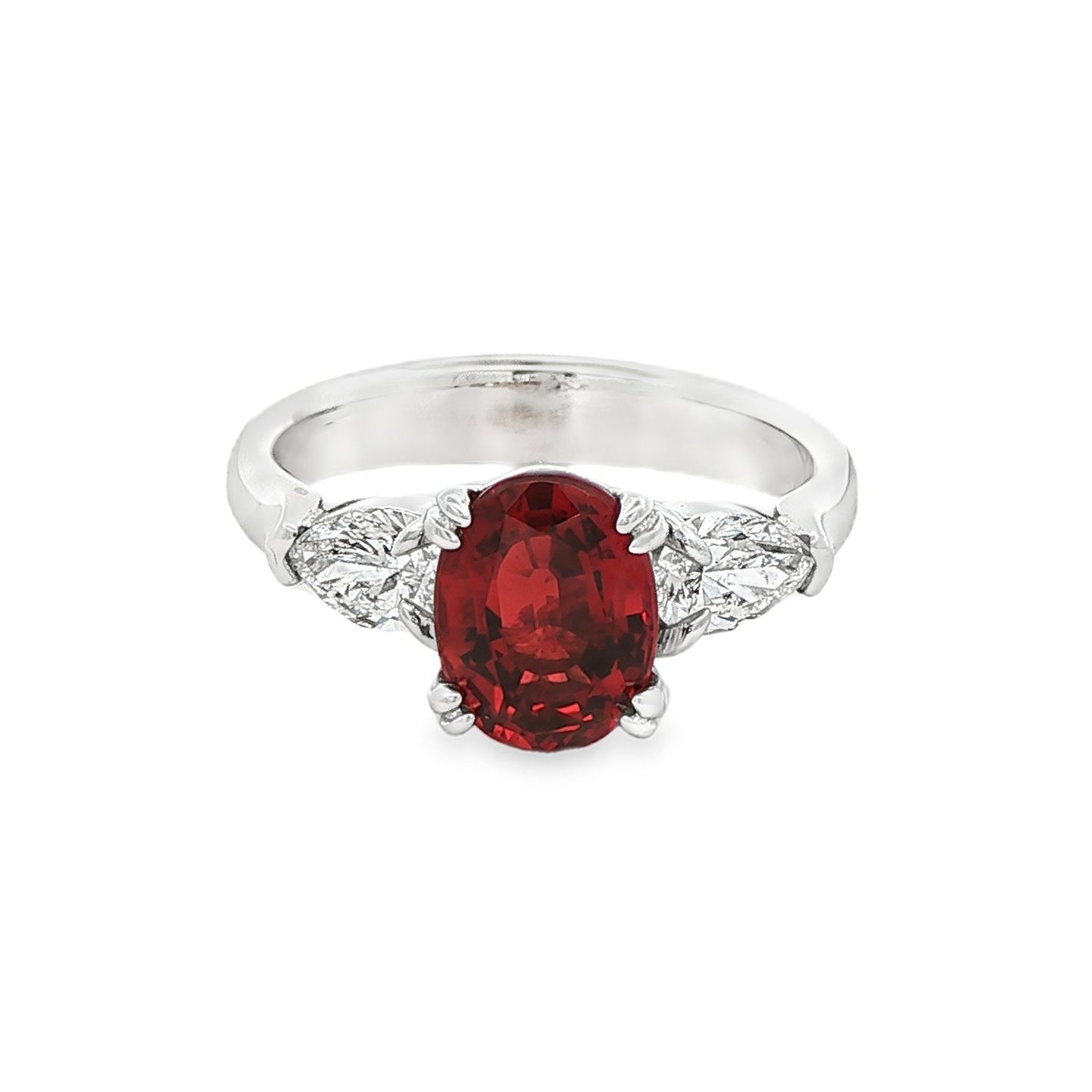 14K White gold ring with red ruby center and pear shape diamond shoulders. Item J35580 - ABC Jewelry Co. 