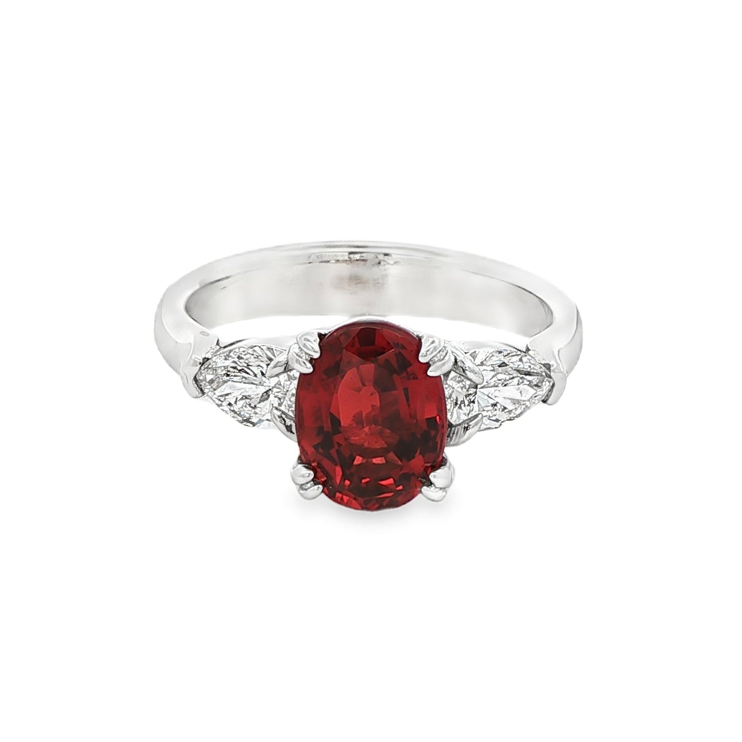14K White gold ring with red ruby center and pear shape diamond shoulders. Item J35580 - ABC Jewelry Co. 